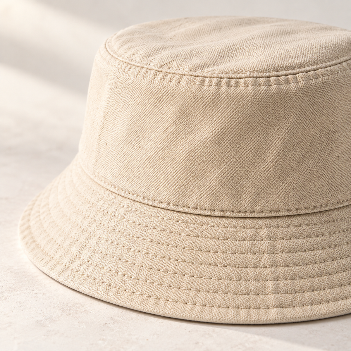 Cove Canvas Bucket in oat: surface and stitching detail