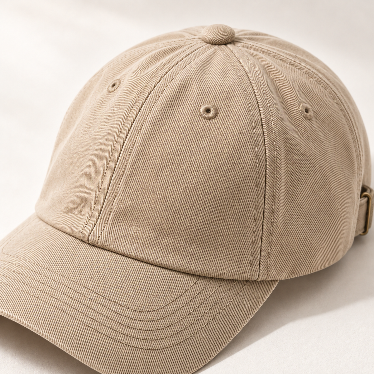 Dune Panel Cap in sand: surface and stitching detail