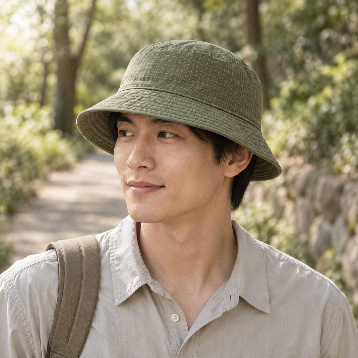 Grove Ripstop Bucket in moss: adult styling view; clothing not included