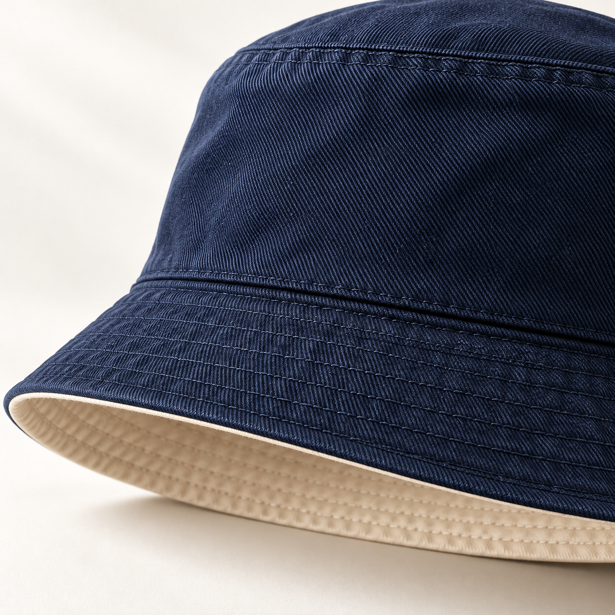 Harbor Twill Bucket in navy and mushroom: surface and stitching detail