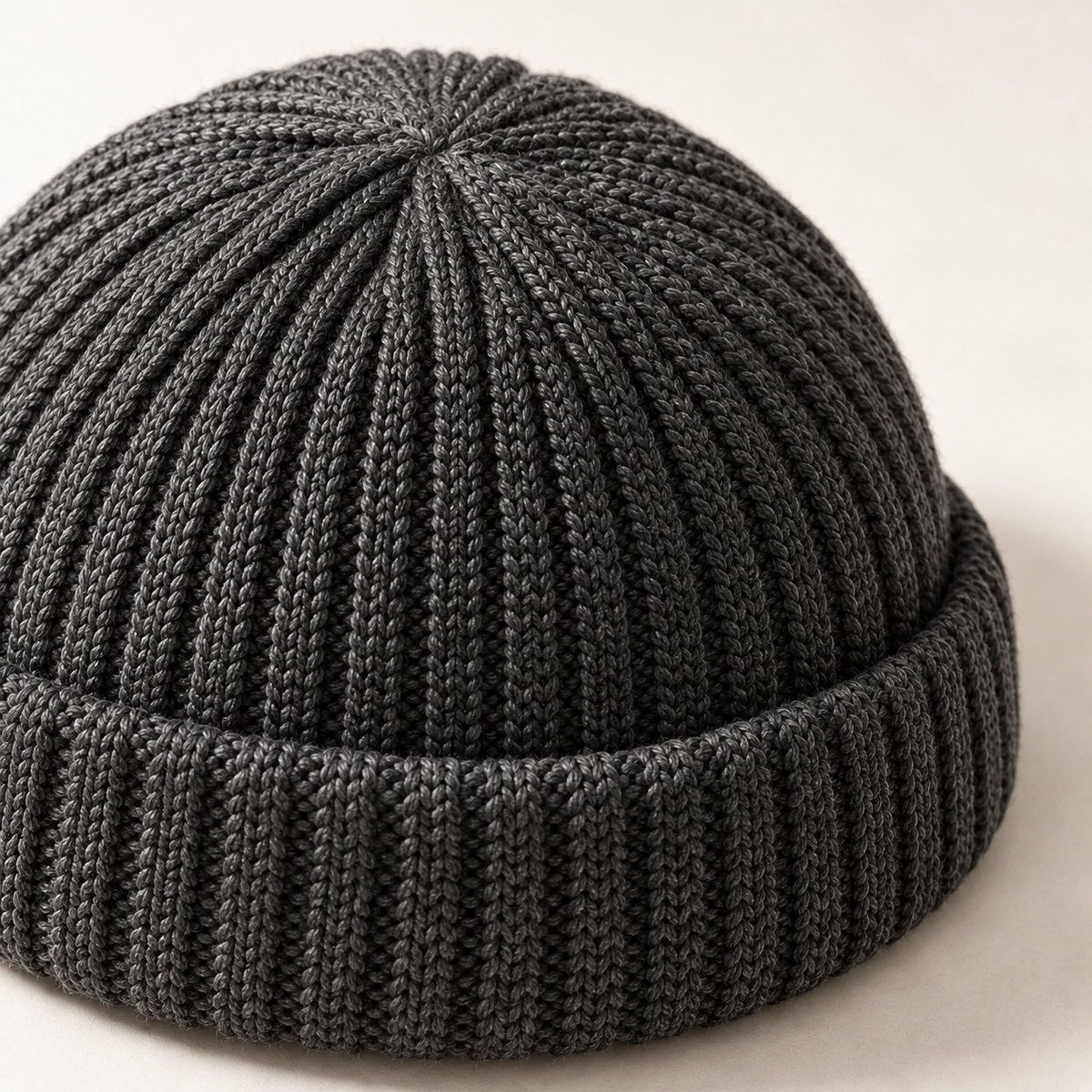 Rove Fisherman Beanie in charcoal: surface and stitching detail